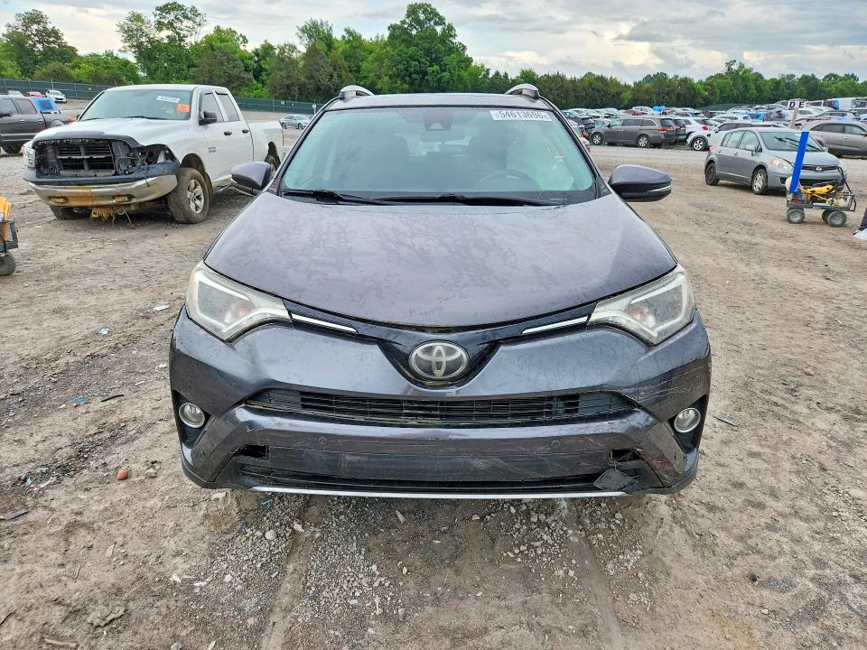 2017 Toyota VIN JTMRFREV2HJ704477 COPART salvage auction — SIDE, Tn - Salvage Certificate, sold $5,500 on 2026-07-02 (photo 5)