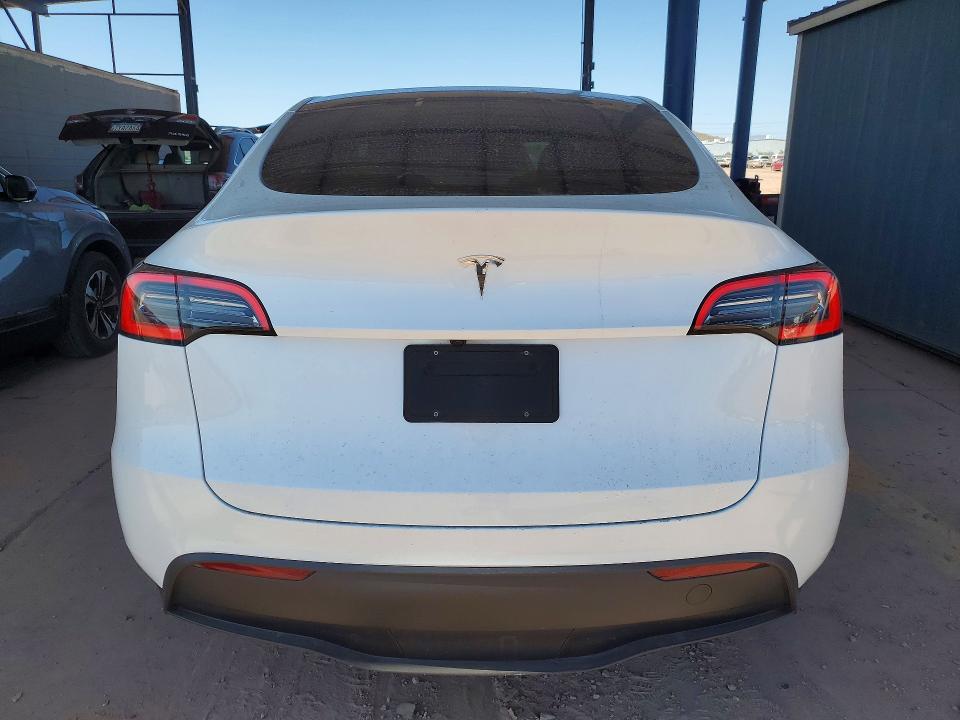 2025 Tesla Model y VIN 7SAYGDED0SA377272 COPART salvage auction — FRONT END, AZ - CERT OF TITLE - SALVAGE, sold $7,800 on 2026-07-28 (photo 6)