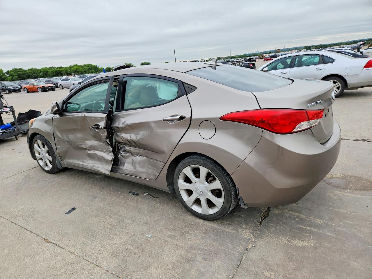 2013 Hyundai Elantra VIN 5NPDH4AE0DH244719 COPART salvage auction — Side, TX - SALVAGE VEHICLE TITLE, sold $1,350 on 2026-07-02 (photo 2)