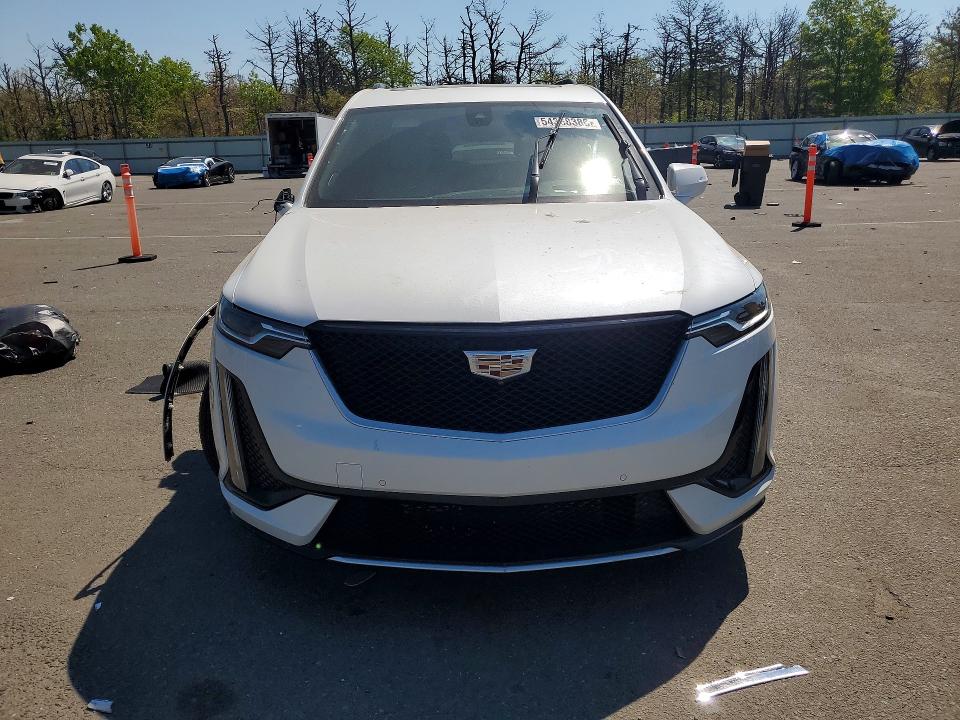 2023 Cadillac Xt6 VIN 1GYKPGRS4PZ127433 COPART salvage auction — SIDE, Id - Salvage Certificate Of Title, sold $7,800 on 2026-08-24 (photo 5)