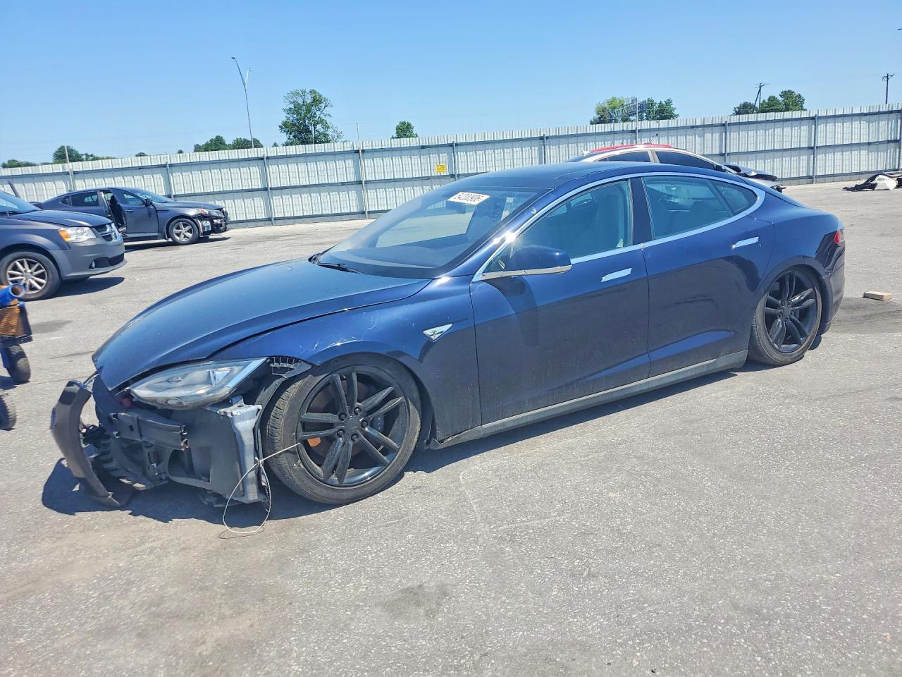 2013 Tesla Model S VIN 5YJSA1AG2DFP12122 — COPART salvage auction photo