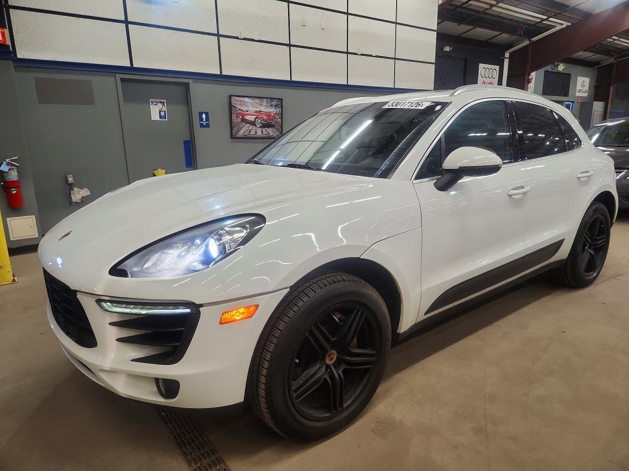 2015 Porsche Macan VIN WP1AB2A57FLB55025 COPART salvage auction — Minor Dent/Scratches, WV - CERTIFICATE OF TITLE, sold $8,900 on 2026-06-09 (photo 1)