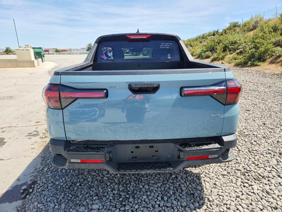 2024 Hyundai Santa cruz VIN 5NTJBDDE6RH110497 COPART salvage auction — SIDE, Nv - Salvage Title, sold $7,500 on 2026-07-09 (photo 6)