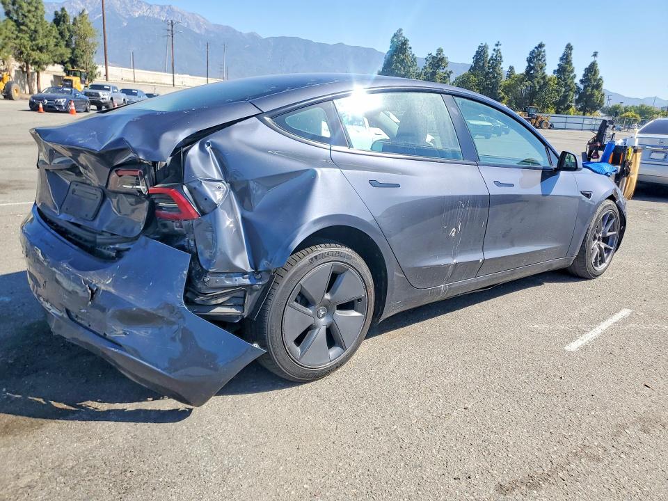 2023 Tesla Model 3 VIN 5YJ3E1EA1PF506812 COPART salvage auction — REAR END, Ca - Salvage Certificate, sold $4,250 on 2026-07-28 (photo 3)