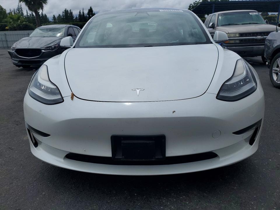 2020 Tesla Model 3 VIN 5YJ3E1EB9LF650112 COPART salvage auction — SIDE, Ca - Salvage Certificate, sold $9,600 on 2026-07-07 (photo 5)