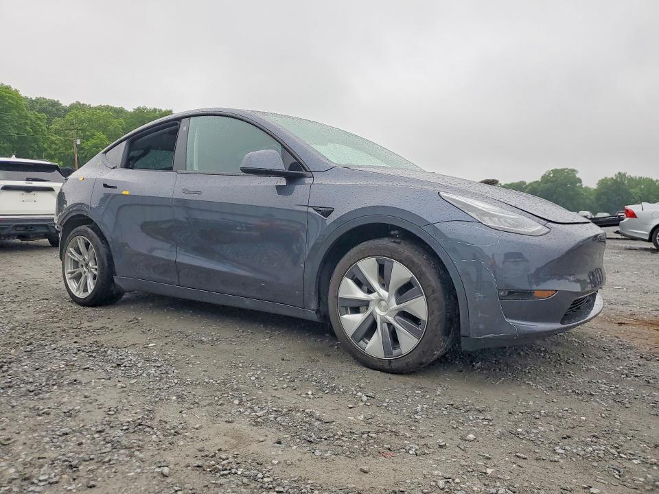 2022 Tesla Model y VIN 7SAYGDEE1NA015450 COPART salvage auction — REAR END, Nc - Salvage Certificate Of Title, sold $4,550 on 2026-07-29 (photo 4)