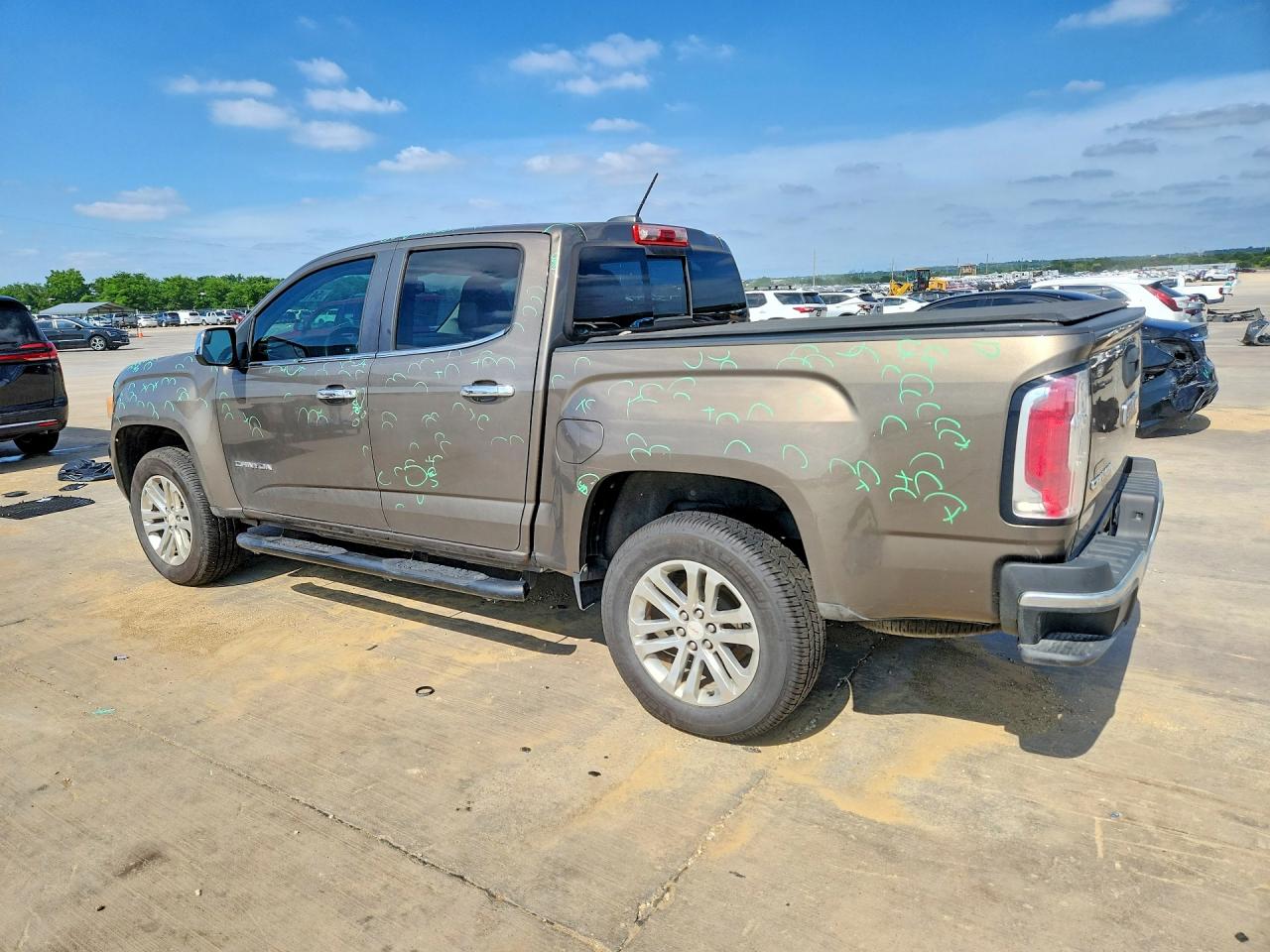 2015 GMC Canyon VIN 1GTG5CE31F1236812 COPART salvage auction — Hail, TX - CERTIFICATE OF TITLE, sold $5,800 on 2026-07-09 (photo 2)