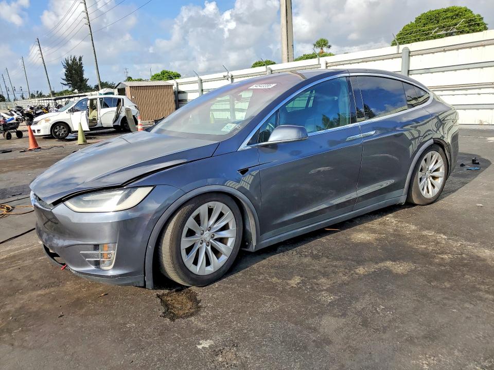 2017 Tesla Model x VIN 5YJXCDE29HF052215 COPART salvage auction — FRONT END, Fl - Certificate Of Title (P), sold $9,300 on 2026-07-21 (photo 1)