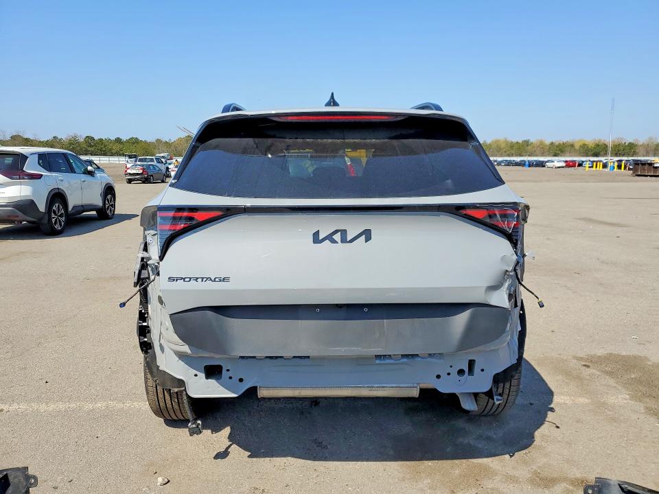 2026 Kia Sportage VIN 5XYK6CDF7TG388561 COPART salvage auction — REAR END, Ny - Mv-907A Salvage Certificate, sold $15,600 on 2026-07-15 (photo 6)