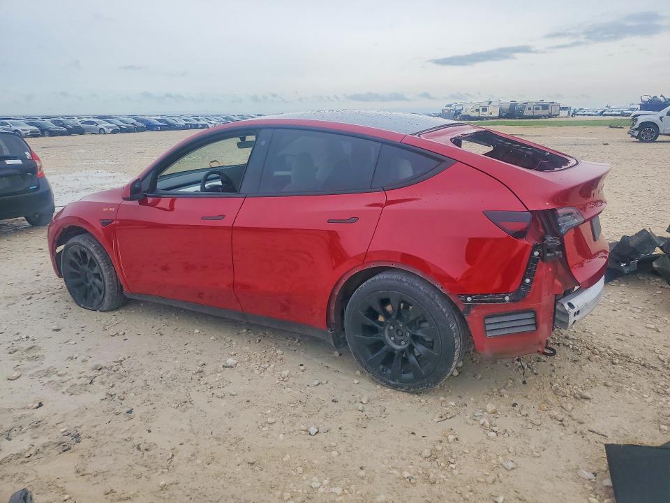2023 Tesla Model y VIN 7SAYGDEE9PA099620 COPART salvage auction — REAR END, Tx - Salvage Vehicle Title, sold $6,400 on 2026-07-16 (photo 2)