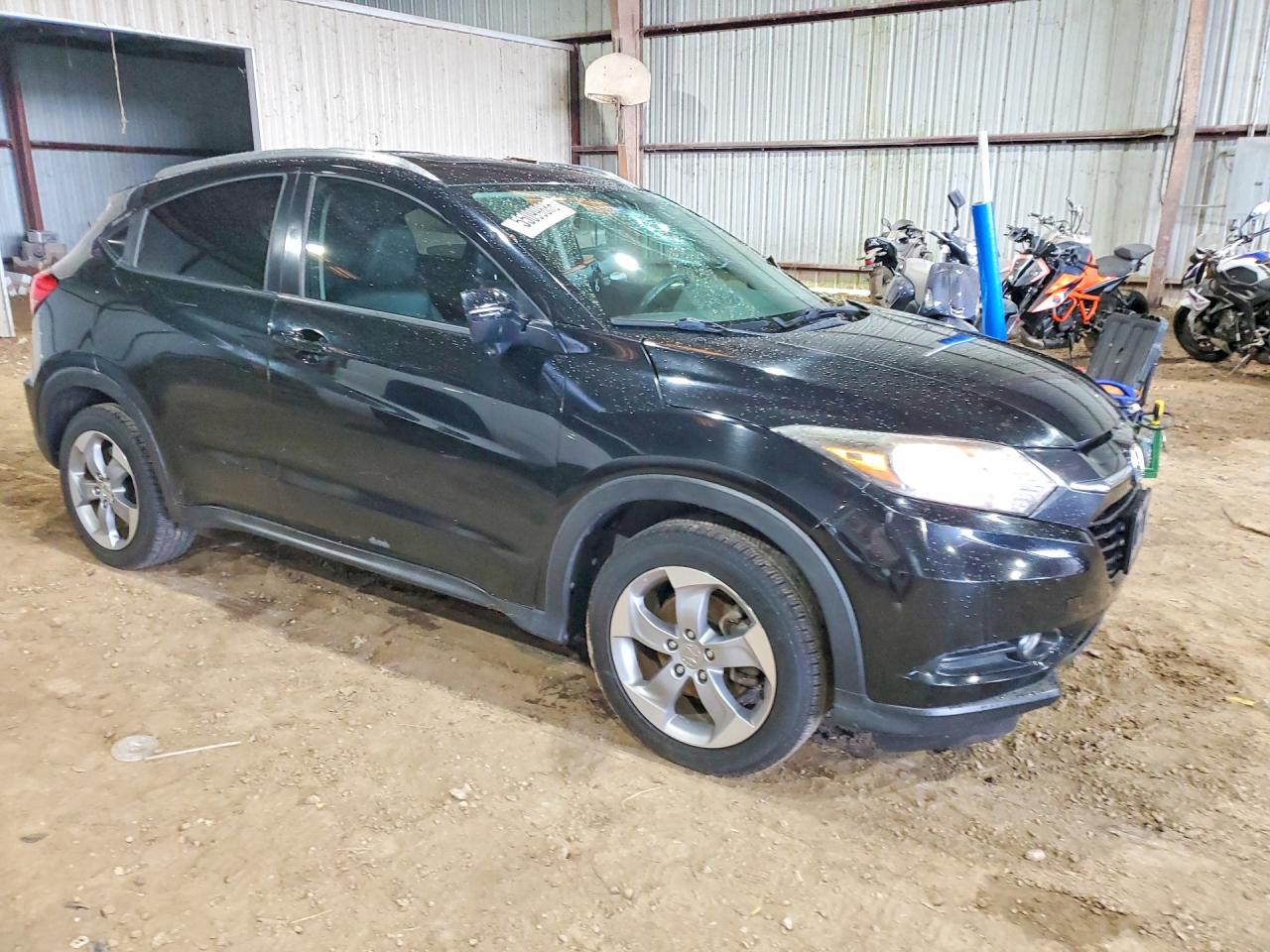 2016 Honda HR-V VIN 3CZRU6H70GM767283 COPART salvage auction — Water/Flood, TX - SALVAGE TITLE-FLOOD DAMAGE, sold $2,800 on 2026-06-29 (photo 4)