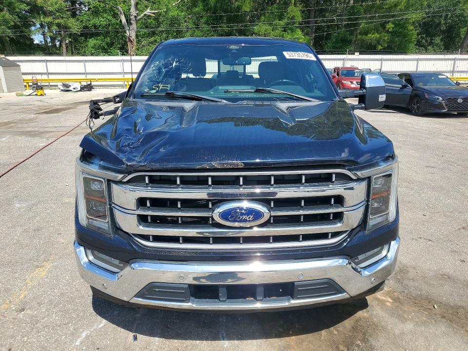2021 Ford F-150 lightning VIN 1FTFW1CD7MFC30411 COPART salvage auction — ALL OVER, AL - CERT OF TITLE-SALVAGE TITLE, sold $9,500 on 2026-08-24 (photo 5)