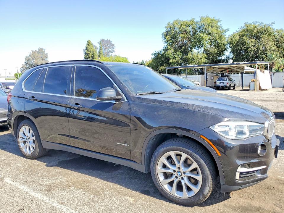 2016 BMW X5 VIN 5UXKT0C52G0S79032 COPART salvage auction — MINOR DENT/SCRATCHES, Ca - Dis/Dlr/Exp Only Clean Title (P), sold $1,550 on 2026-07-24 (photo 4)