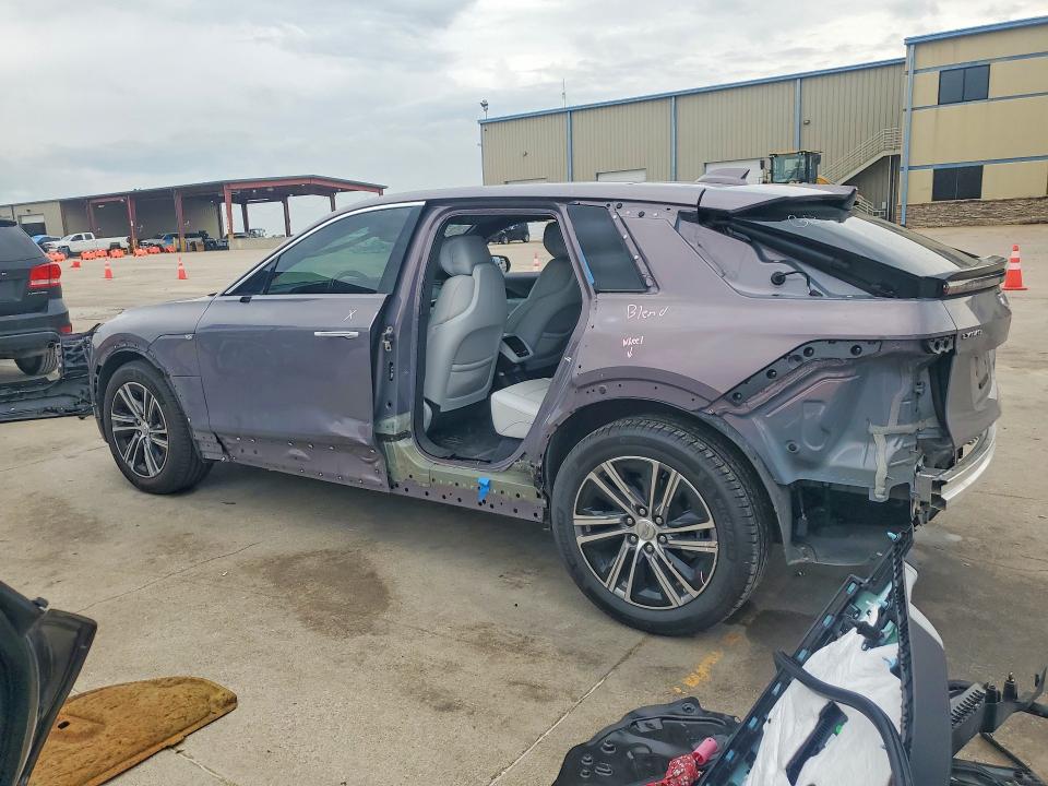 2024 Cadillac Lyriq VIN 1GYKPRRL4RZ131621 COPART salvage auction — SIDE, Tx - Salvage Vehicle Title, sold $16,600 on 2026-07-09 (photo 2)