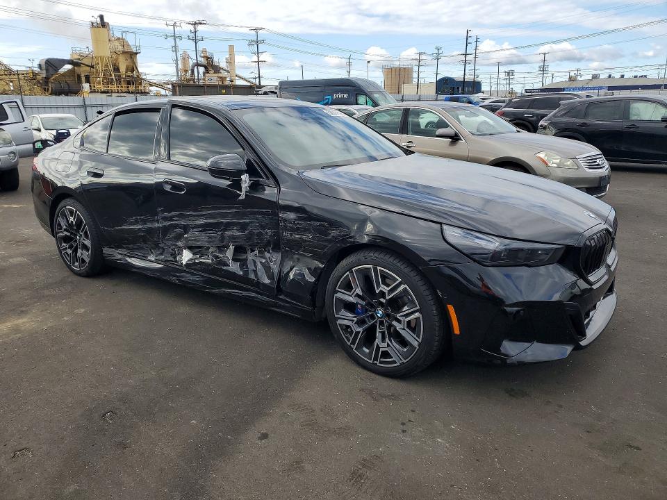 2025 BMW 5er VIN WBA43FJ00SCU24593 COPART salvage auction — SIDE, Ca - Salvage Certificate, sold $16,400 on 2026-07-27 (photo 4)