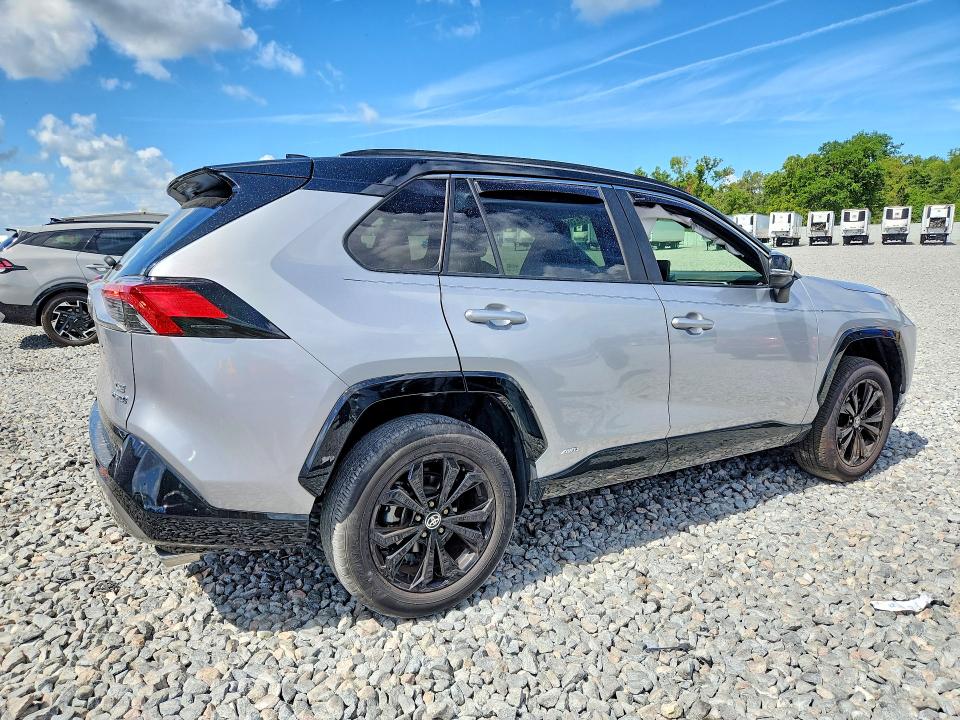 2023 Toyota Rav 4 VIN JTME6RFV6PJ031902 COPART salvage auction — SIDE, Fl - Cert Of Title Slvg Rebuildable, sold $13,500 on 2026-07-08 (photo 3)