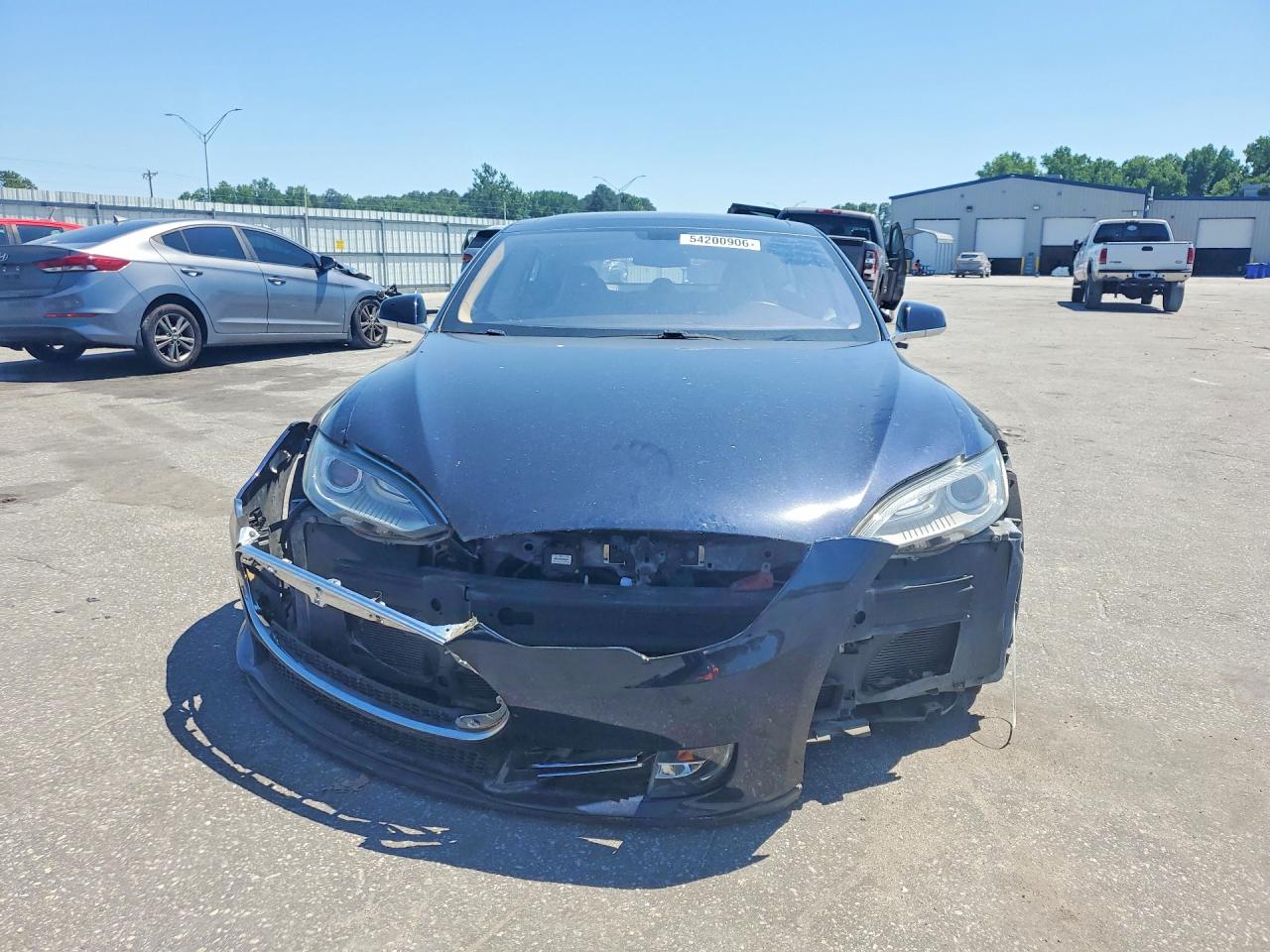 2013 Tesla Model S VIN 5YJSA1AG2DFP12122 COPART salvage auction — Front End, NC - DEALER ONLY CLEAN TITLE (P), sold $2,450 on 2026-07-03 (photo 5)