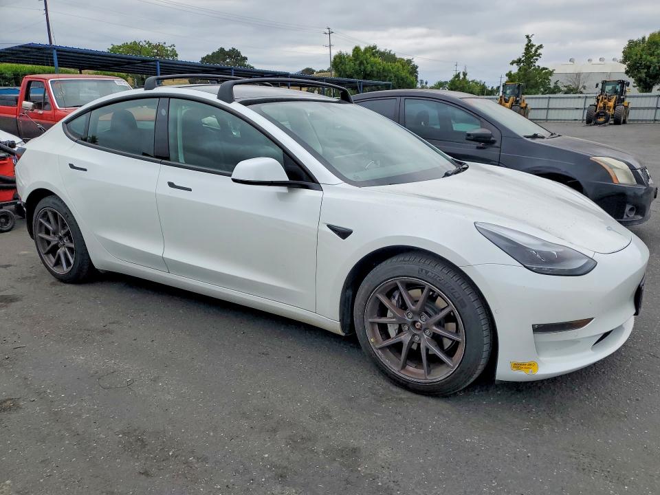 2022 Tesla Model 3 VIN 5YJ3E1EBXNF180630 COPART salvage auction — REAR END, Ca - Salvage Certificate, sold $8,800 on 2026-07-14 (photo 4)
