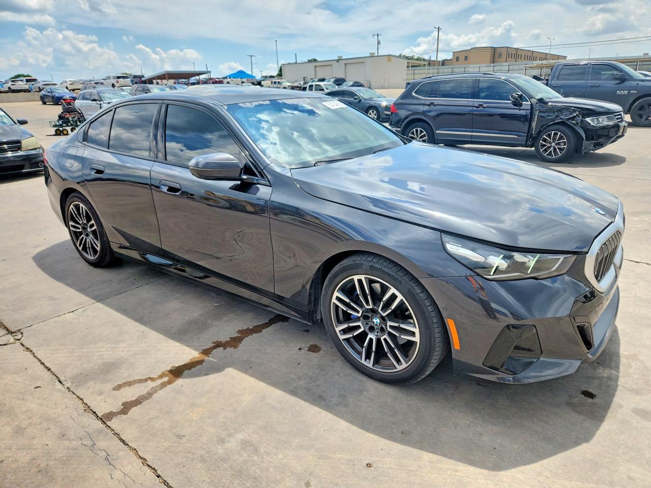 2025 BMW 5 Series VIN WBA43FJ03SCU14981 COPART salvage auction — Vandalized, TX - SALVAGE VEHICLE TITLE, sold $34,750 on 2026-08-06 (photo 4)