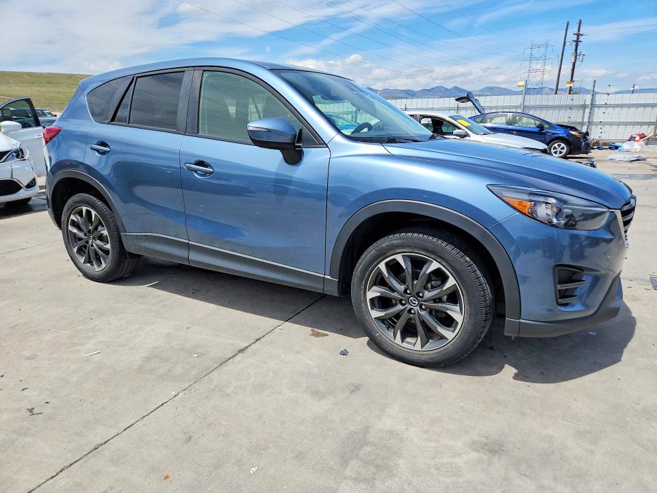 2016 Mazda VIN JM3KE4DY6G0695992 COPART salvage auction — FRONT END, Co - Public - Salvage Title, sold $4,100 on 2026-07-27 (photo 4)