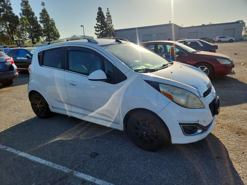2013 Chevrolet VIN KL8CF6S97DC519909 COPART salvage auction — NORMAL WEAR, Ca - Salvage Certificate, sold $200 on 2026-07-02 (photo 4)