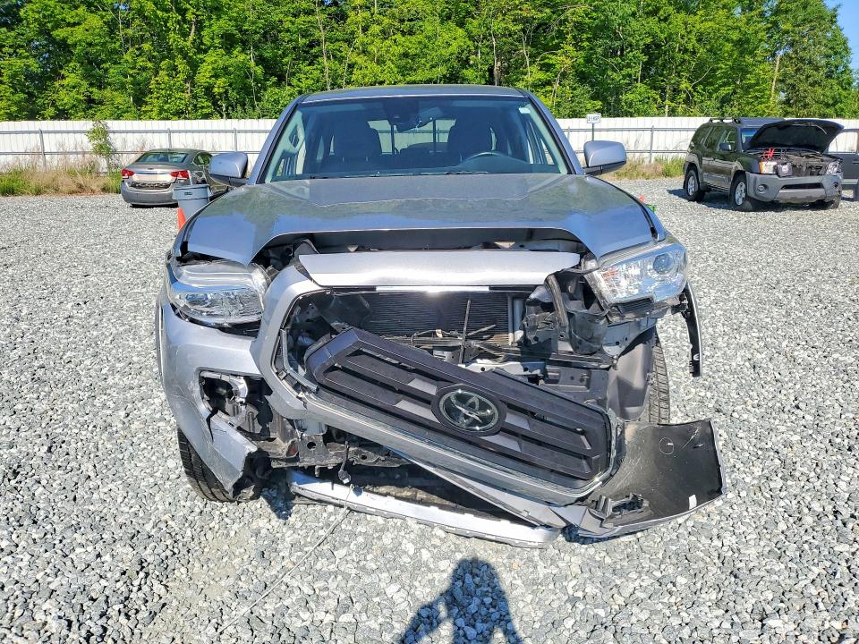 2021 Toyota Tacoma VIN 5TFAZ5CN4MX116412 COPART salvage auction — FRONT END, NC - SALVAGE CERTIFICATE OF TITLE, sold $10,200 on 2026-07-08 (photo 5)