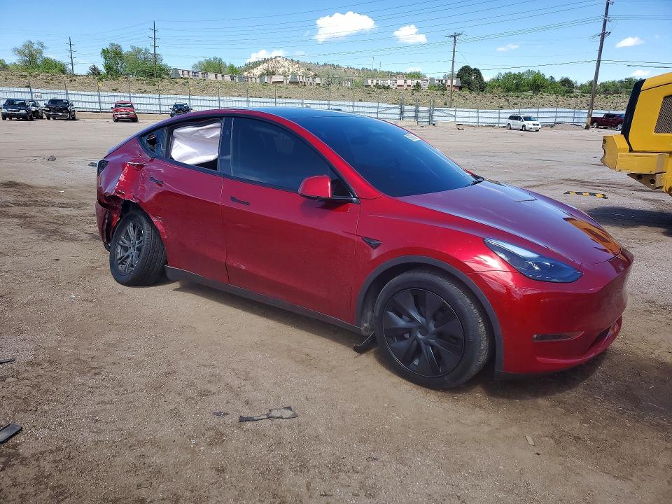 2025 Tesla VIN 7SAYGDEE1SF307405 COPART salvage auction — SIDE, Co - Salvage Title, sold $275 on 2026-07-27 (photo 4)