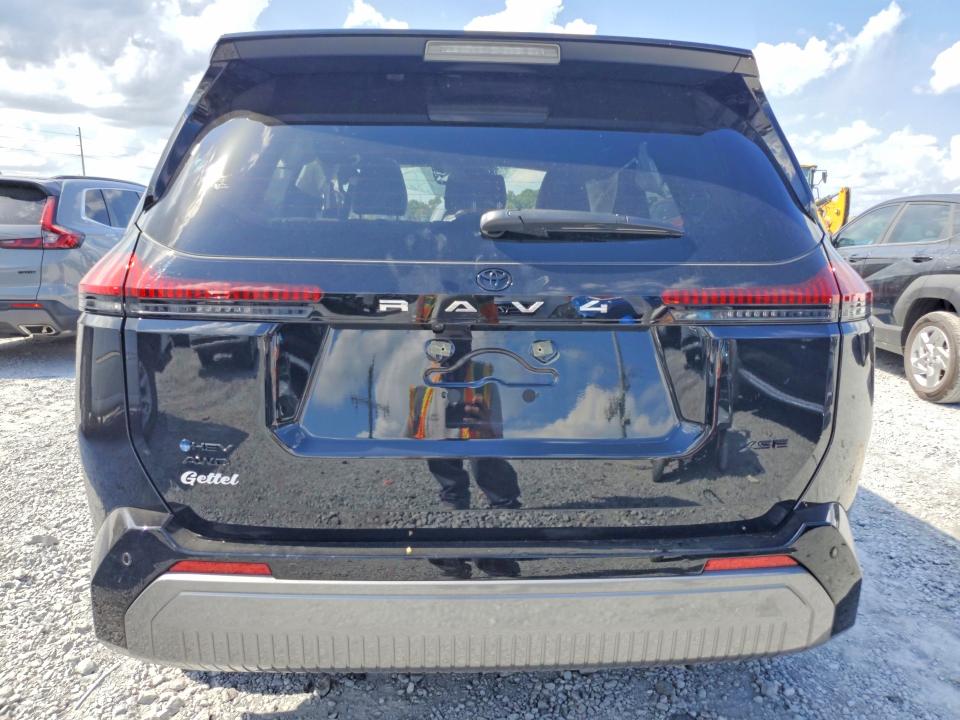 2026 Toyota Rav 4 VIN JTM6CRAV1TD301678 COPART salvage auction — SIDE, Fl - Cert Of Title Slvg Rebuildable, sold $10,200 on 2026-07-17 (photo 6)
