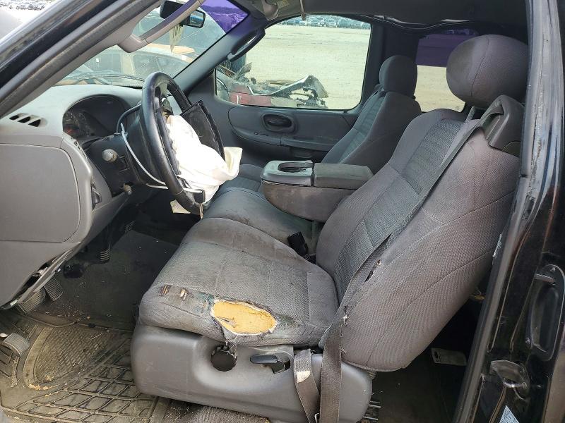 2003 Ford F-150 lightning VIN 1FTRX07W33KD10259 COPART salvage auction — SIDE, Tx - Salvage Vehicle Title, sold $450 on 2026-07-02 (photo 7)