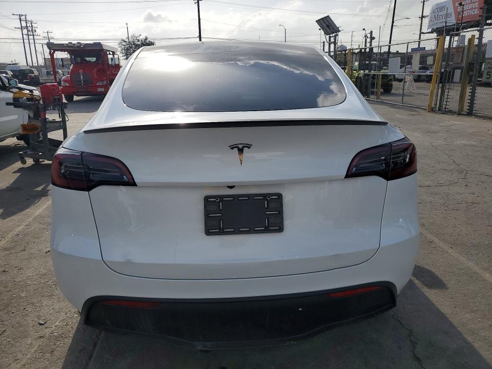2024 Tesla Model y VIN 7SAYGDED1RF193049 COPART salvage auction — FRONT END, Ca - Salvage Certificate, sold $15,400 on 2026-07-27 (photo 6)