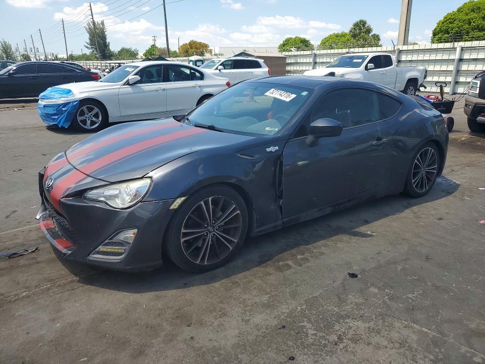 2016 Scion VIN JF1ZNAA13G9701004 COPART salvage auction — FRONT END, Fl - Cert Of Title Slvg Rebuildable, sold $1,050 on 2026-07-29 (photo 1)