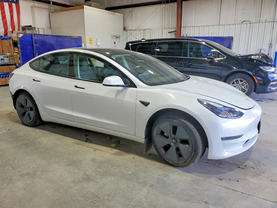 2022 Tesla Model 3 VIN 5YJ3E1EA2NF112071 COPART salvage auction — REAR END, MT - SALVAGE CERTIFICATE OF A VEHIC, sold $5,200 on 2026-08-03 (photo 4)