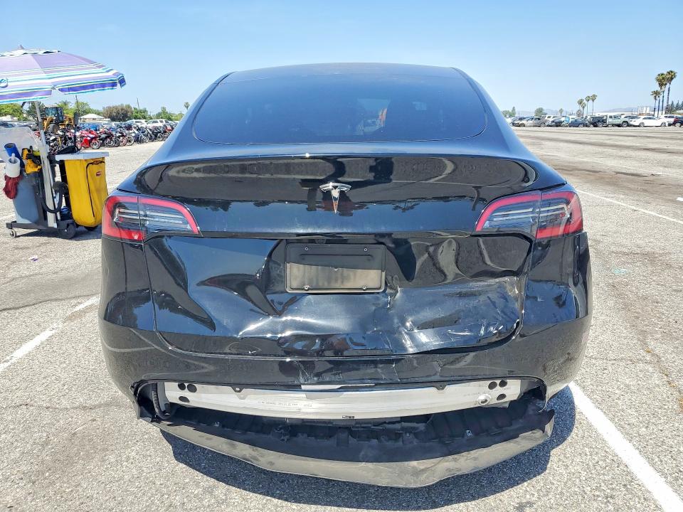 2024 Tesla Model y VIN 7SAYGDED5RF115258 COPART salvage auction — REAR END, Ca - Salvage Certificate, sold $15,000 on 2026-07-24 (photo 6)