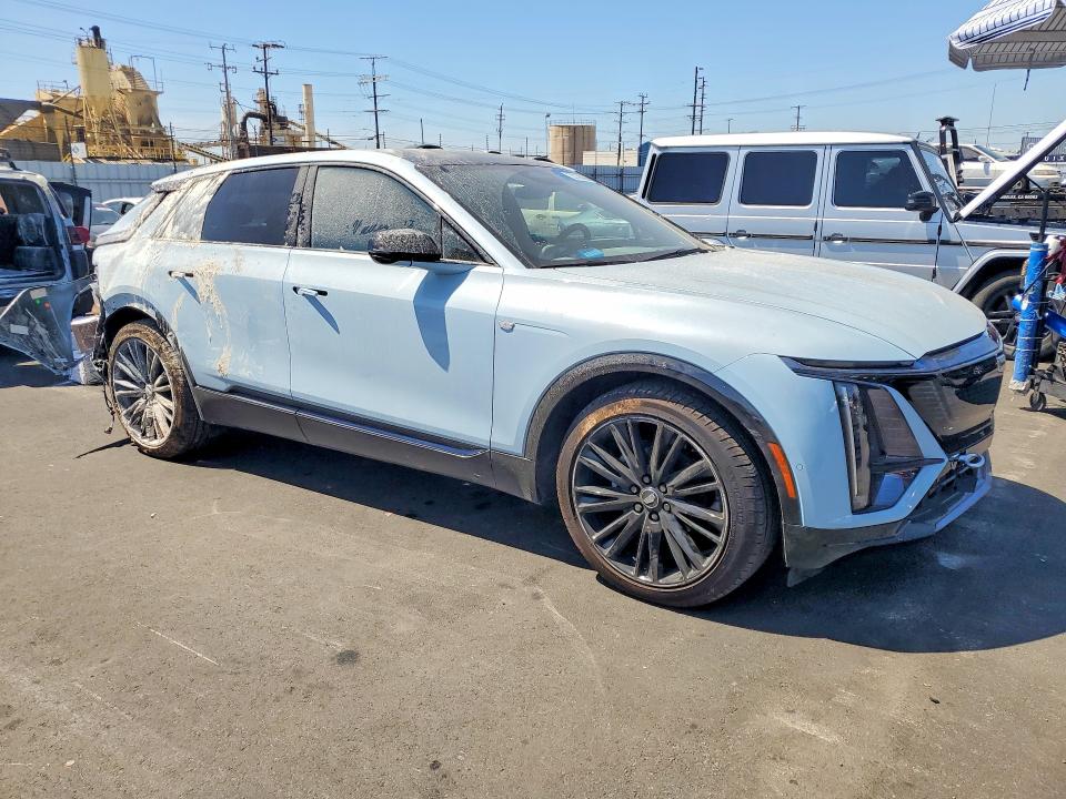 2025 Cadillac Lyriq VIN 1GYKPURL6SZ301910 COPART salvage auction — REAR END, Ca - Salvage Certificate, sold $14,100 on 2026-07-06 (photo 4)