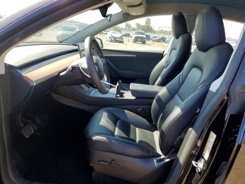 2023 Tesla Model y VIN 7SAYGDEE5PA147131 COPART salvage auction — REAR END, Ca - Salvage Certificate, sold $10,800 on 2026-07-28 (photo 7)