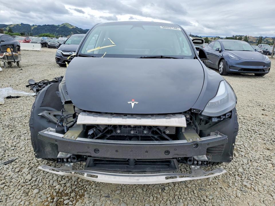 2023 Tesla Model y VIN 7SAYGDEE9PF812518 COPART salvage auction — SIDE, CA - SALVAGE CERTIFICATE, sold $9,000 on 2026-08-27 (photo 5)