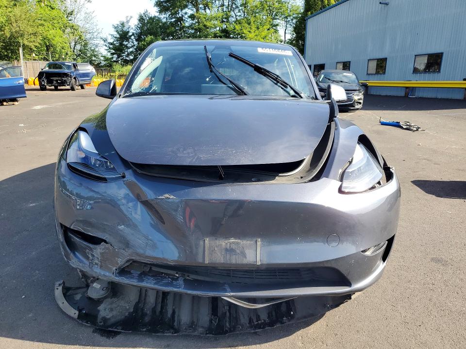 2023 Tesla Model y VIN 7SAYGDEE5PF645848 COPART salvage auction — SIDE, Or - Salvage Title Certificate, sold $6,400 on 2026-07-20 (photo 5)