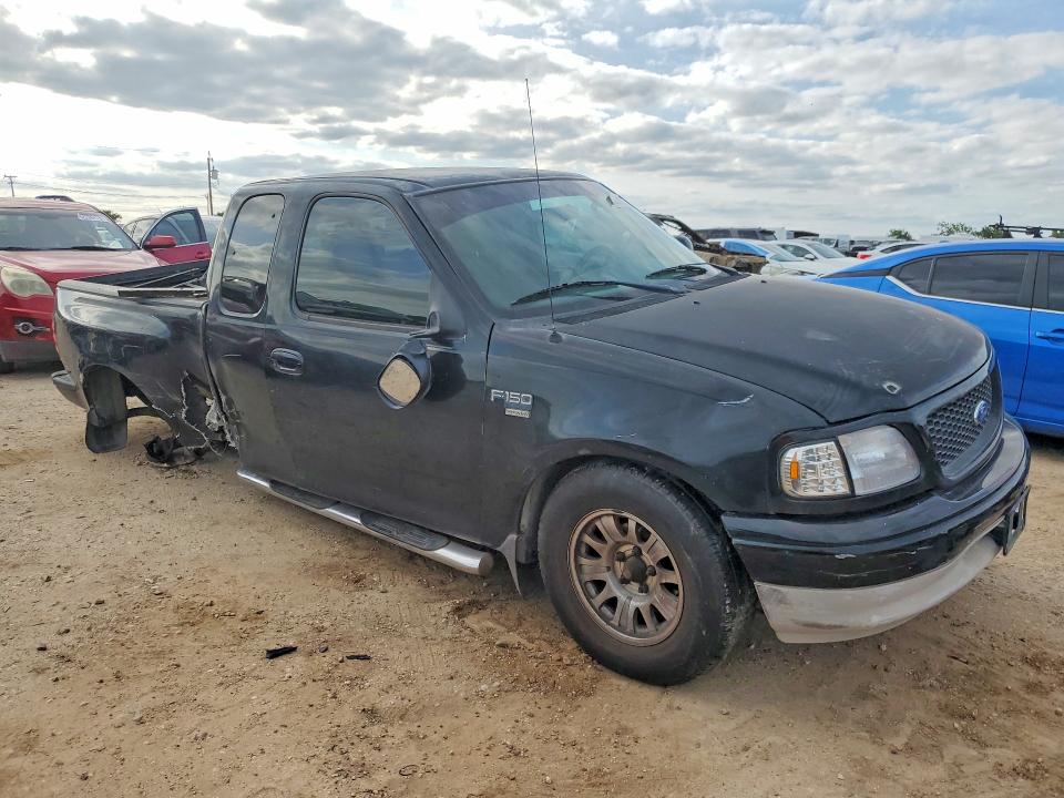 2003 Ford F-150 lightning VIN 1FTRX07W33KD10259 COPART salvage auction — SIDE, Tx - Salvage Vehicle Title, sold $450 on 2026-07-02 (photo 4)