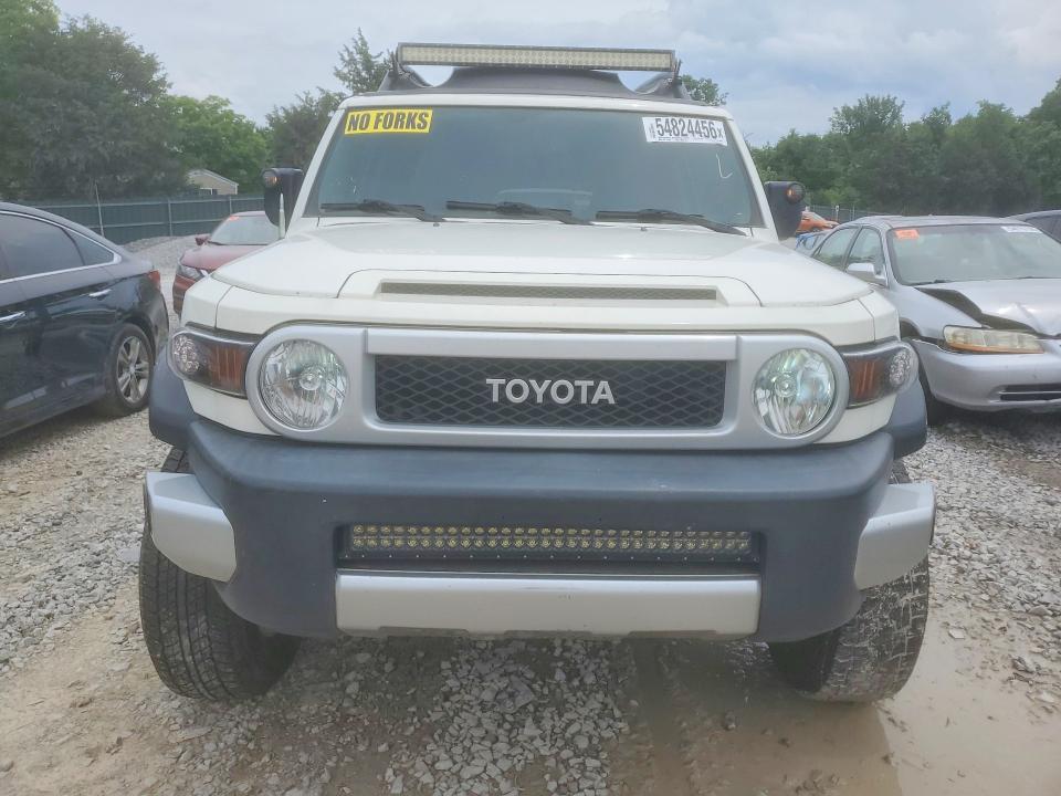 2011 Toyota Fj cruiser VIN JTEBU4BFXBK104312 COPART salvage auction — SIDE, Tn - Salvage Certificate, sold $7,700 on 2026-07-30 (photo 5)