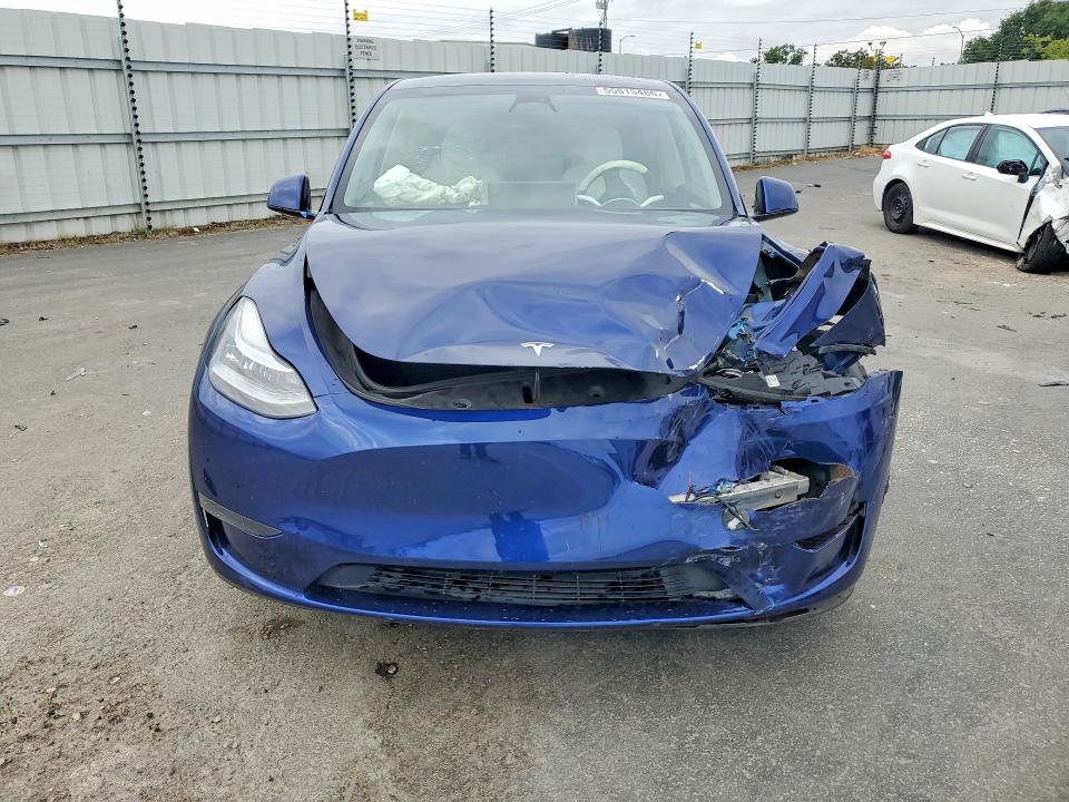2023 Tesla Model y VIN 7SAYGDEE7PA089023 COPART salvage auction — FRONT END, Ca - Salvage Certificate, sold $7,900 on 2026-07-14 (photo 5)