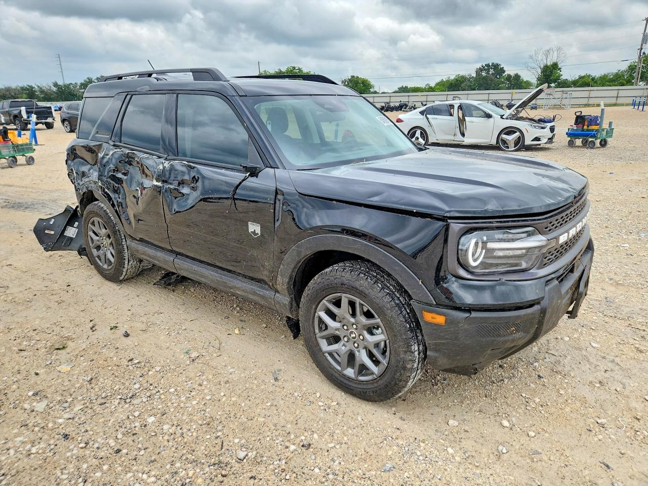 2025 Ford Bronco Sport VIN 3FMCR9BN9SRF76362 COPART salvage auction — Side, TX - SALVAGE VEHICLE TITLE, sold $5,100 on 2026-07-09 (photo 4)