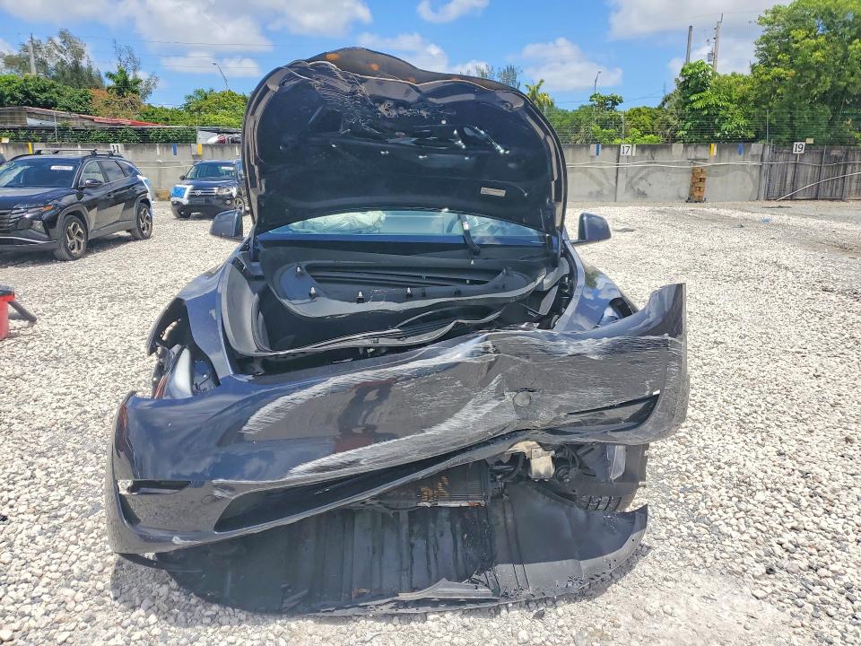 2024 Tesla VIN 7SAYGDED1RF034256 COPART salvage auction — REAR END, Fl - Cert Of Title Slvg Rebuildable, sold $6,000 on 2026-07-28 (photo 5)