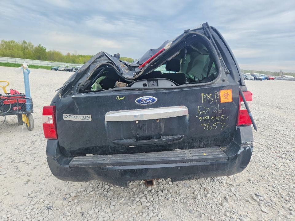 2012 Ford VIN 1FMJU2A5XCEF27657 COPART salvage auction — ALL OVER, MI - CERTIFICATE OF TITLE, sold $575 on 2026-07-09 (photo 6)