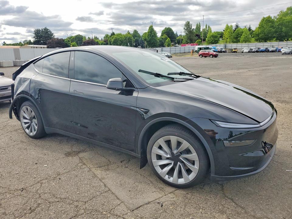 2026 Tesla Model y VIN 7SAYGDEE6TF567123 COPART salvage auction — REAR END, Or - Salvage Title Certificate, sold $18,100 on 2026-07-13 (photo 4)