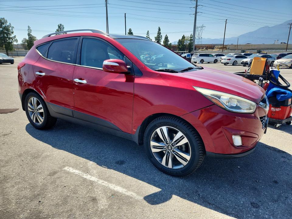 2014 Hyundai Tucson VIN KM8JU3AG6EU919146 COPART salvage auction — MINOR DENT/SCRATCHES, Ca - Salvage Certificate, sold $1,250 on 2026-07-16 (photo 4)