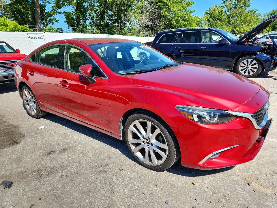 2016 Mazda VIN JM1GJ1T53G1434426 COPART salvage auction — HAIL, Mo - Certificate Of Title, sold $6,700 on 2026-07-14 (photo 4)