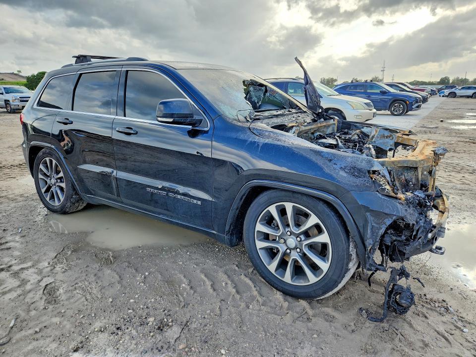 2018 Jeep Grand cherokee VIN 1C4RJFCM7JC421851 COPART salvage auction — ENGINE BURN, Fl - Cert Of Title Slvg Rebuildable, sold $425 on 2026-07-04 (photo 4)
