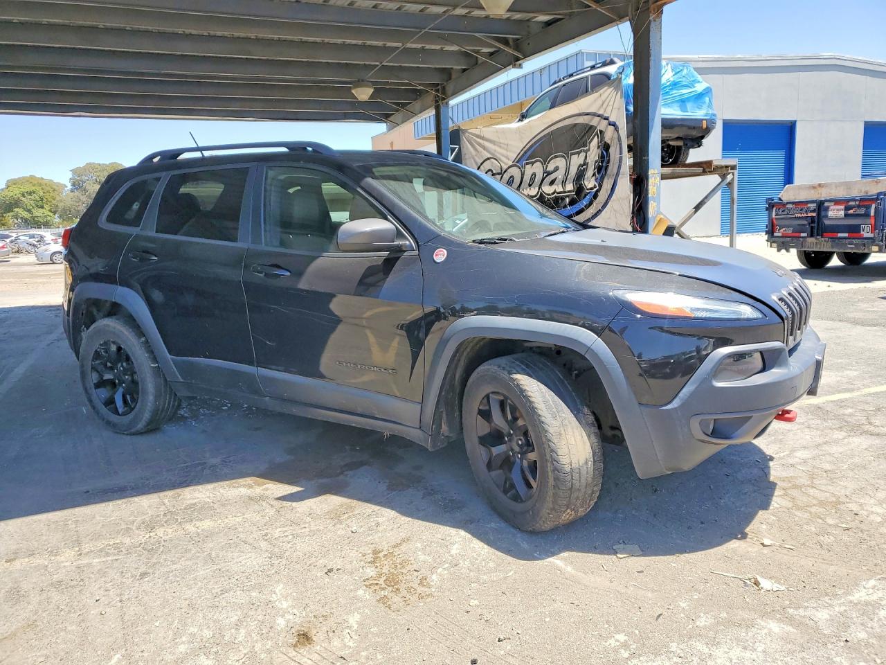 2015 Jeep VIN 1C4PJMBS7FW770039 COPART salvage auction — Mechanical, CA - DIS/DLR/EXP ONLY CLEAN TITLE, sold $1,800 on 2026-09-11 (photo 4)