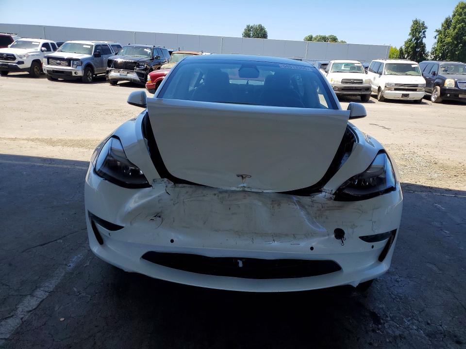 2022 Tesla Model 3 VIN 5YJ3E1EA8NF121387 COPART salvage auction — FRONT END, Ca - Salvage Certificate, sold $4,800 on 2026-07-23 (photo 5)