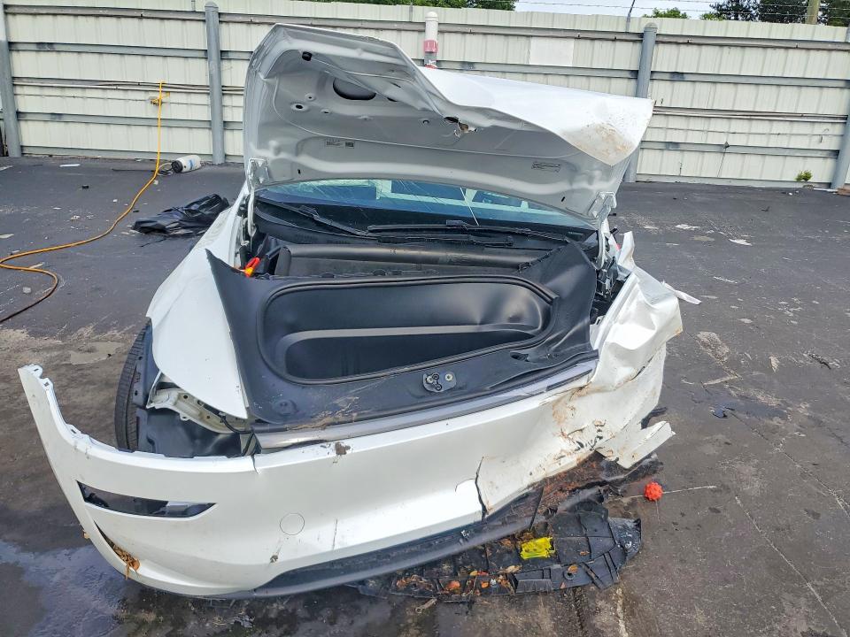 2026 Tesla Model y VIN 7SAYGDED6TA644142 COPART salvage auction — ALL OVER, Fl - Certificate Of Destruction, sold $300 on 2026-07-27 (photo 5)